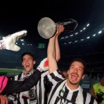 Football. UEFA Cup Final, Second Leg. Turin, Italy. 19th May 1993. Juventus 3 v Borussia Dortmund 0 (Juventus win 6-1 on aggregate). Gianluca Vialli (right) holds the trophy aloft as he celebrates with his team-mates.